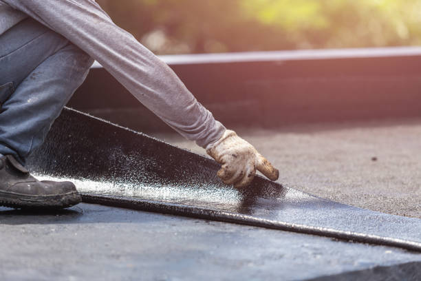 Professional Basement Waterproofing technician working in Camden, IN